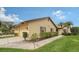 Exterior view of a villa with a two-car garage at 5911 Doral Dr, Sarasota, FL 34243