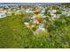 Aerial shot featuring a lush tree canopy and a private residence with pool at 631 43Rd Street W Blvd, Palmetto, FL 34221