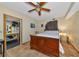 Bedroom with tiled floor and wooden furniture at 631 43Rd Street W Blvd, Palmetto, FL 34221