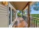 Long wooden deck with access to the interior, featuring a tranquil setting at 631 43Rd Street W Blvd, Palmetto, FL 34221