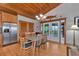 Dining area with glass-top table and access to deck at 631 43Rd Street W Blvd, Palmetto, FL 34221