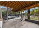 Screened pool area with spiral staircase and outdoor seating at 631 43Rd Street W Blvd, Palmetto, FL 34221