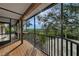 Peaceful screened porch overlooking lush natural landscape at 631 43Rd Street W Blvd, Palmetto, FL 34221