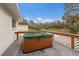 Hot tub on deck overlooking the backyard at 6424 18Th E Ave, Bradenton, FL 34208