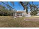 House exterior with screened porch and landscaped yard at 6424 18Th E Ave, Bradenton, FL 34208