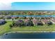 Community overview showcasing lakefront homes and landscaping at 6579 Willowshire Way, Bradenton, FL 34212