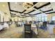 Spacious dining room with elegant chandeliers at 6579 Willowshire Way, Bradenton, FL 34212