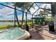 Relax in your hot tub overlooking a serene lake view at 6579 Willowshire Way, Bradenton, FL 34212