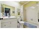 Clean bathroom with shower/tub combo and white vanity at 7117 27Th Ave Dr W # 7117, Bradenton, FL 34209