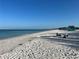 Relaxing beach view with a wide expanse of white sand and clear water at 7117 27Th Ave Dr W # 7117, Bradenton, FL 34209