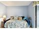 Bedroom with daybed and access to patio at 7117 27Th Ave Dr W # 7117, Bradenton, FL 34209