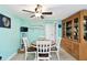 Bright dining room with table and chairs, features built-in hutch at 7117 27Th Ave Dr W # 7117, Bradenton, FL 34209