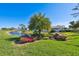 Landscaped pond with fountain, adding to the community's serene atmosphere at 7117 27Th Ave Dr W # 7117, Bradenton, FL 34209