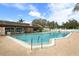 Community pool with surrounding patio and seating at 7117 27Th Ave Dr W # 7117, Bradenton, FL 34209