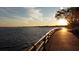 Tranquil waterfront path at sunset with a view of the water at 7117 27Th Ave Dr W # 7117, Bradenton, FL 34209