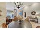 Casual dining area with round table and view into living room at 7312 Riviera Cv, Lakewood Ranch, FL 34202