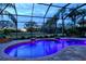 Screened pool area with a fountain and golf course view at 7312 Riviera Cv, Lakewood Ranch, FL 34202