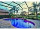 Stunning pool and patio with screened enclosure and golf views at 7312 Riviera Cv, Lakewood Ranch, FL 34202