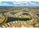 Community overview with home highlighted near lake at 7432 Summerland Cv, Lakewood Ranch, FL 34202