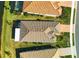 Top-down view of house roof and surrounding landscape at 7432 Summerland Cv, Lakewood Ranch, FL 34202