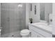 Clean bathroom with a toilet and a walk in shower at 7432 Summerland Cv, Lakewood Ranch, FL 34202