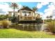 Community entrance with water feature and landscaping at 7432 Summerland Cv, Lakewood Ranch, FL 34202