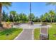 Community memorial with benches and American flag at 7432 Summerland Cv, Lakewood Ranch, FL 34202