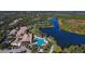 Community features pool, tennis courts, and clubhouse at 7575 Quinto Dr, Sarasota, FL 34238