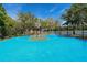 Outdoor basketball court with lake views at 7575 Quinto Dr, Sarasota, FL 34238