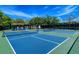 Community pickleball courts with surrounding trees at 7575 Quinto Dr, Sarasota, FL 34238