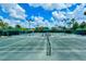 Well-maintained tennis courts with ample lighting at 7575 Quinto Dr, Sarasota, FL 34238