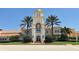 Town Center building with clock tower and landscaping at 7575 Quinto Dr, Sarasota, FL 34238