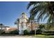 Town Center building with clock tower and landscaping at 7575 Quinto Dr, Sarasota, FL 34238