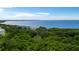 Aerial view of waterfront property and lush mangrove landscape at 7910 34Th W Ave # 102, Bradenton, FL 34209