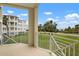 Relaxing balcony overlooking lush green space and neighboring buildings at 7910 34Th W Ave # 102, Bradenton, FL 34209