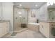 Elegant bathroom with double vanity, soaking tub, and shower at 7910 34Th W Ave # 102, Bradenton, FL 34209