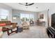 Bright living room with seating area and workspace at 7910 34Th W Ave # 102, Bradenton, FL 34209