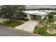 Bird's-eye view of home, showing landscaping and driveway at 8414 Imperial Cir, Palmetto, FL 34221