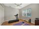 Home gym with treadmill, weights, mats, and ample space at 8994 Wildlife Loop, Sarasota, FL 34238