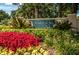 Community entrance with signage and landscaping at 1003 Lake Avoca Dr, Tarpon Springs, FL 34689