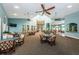 Large community room featuring ample seating and high ceilings at 1003 Lake Avoca Dr, Tarpon Springs, FL 34689