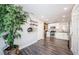 Modern kitchen with white shaker cabinets, stainless steel appliances, and dark flooring at 1003 Lake Avoca Dr, Tarpon Springs, FL 34689