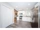 Modern kitchen with stainless steel appliances and white cabinets at 1003 Lake Avoca Dr, Tarpon Springs, FL 34689