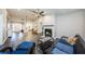 Living room featuring a fireplace and wood-look flooring at 1003 Lake Avoca Dr, Tarpon Springs, FL 34689