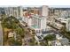 Wide aerial view of highrise building and surrounding city at 101 S Gulfstream Ave # 12C, Sarasota, FL 34236