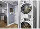 Convenient laundry closet with stacked washer and dryer at 101 S Gulfstream Ave # 12C, Sarasota, FL 34236