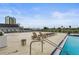 Spacious pool deck with lounge chairs and a view at 101 S Gulfstream Ave # 12C, Sarasota, FL 34236