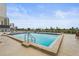 Sparkling rooftop pool with city views at 101 S Gulfstream Ave # 12C, Sarasota, FL 34236