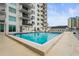 Refreshing community pool with ample deck space for lounging at 101 S Gulfstream Ave # 12C, Sarasota, FL 34236