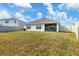 Spacious backyard with a large grassy area at 10328 Charlotte Dr, Parrish, FL 34219